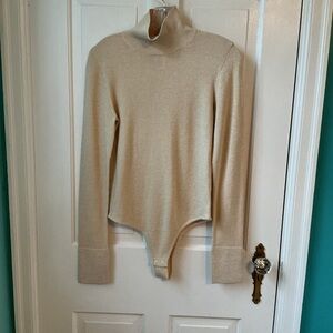 ATHLETA Cream with gold sheen Bodysuit Mockneck Sweater.